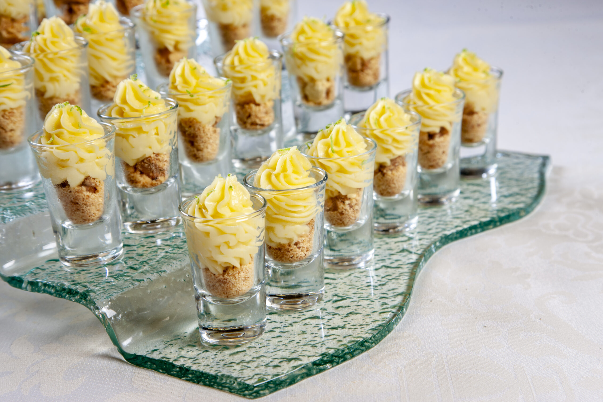 Elegant individual dessert cups with cream topping